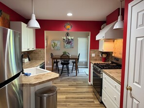 Coffee/tea maker, fridge, microwave, oven - 2BR Charlevoix Getaway - Walk to Lake Michigan Beach - Dog Friendly (Charlevoix)