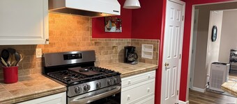 Delightful 2-bedroom dog friendly home in Charlevoix. Steps from Lake MI.