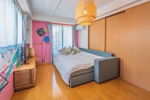 A bedroom with a bed, a desk, and a wardrobe. - THE AOCA TOKYO JIYUGAOKA (Setagaya-ku)