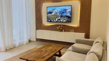 Chalet, balcón, vista al desierto | Área de sala de estar