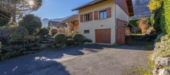 Beautiful Family Home with a Pool, Nestled Between the Lake and the Mountains