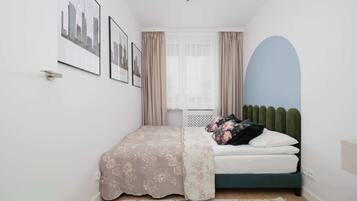 2 bedrooms, desk, iron/ironing board, travel crib