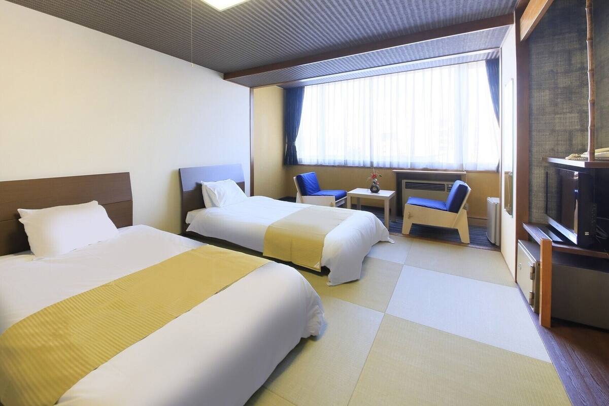 Kamar Twin Ekonomi | Brankas dan Wi-Fi gratis