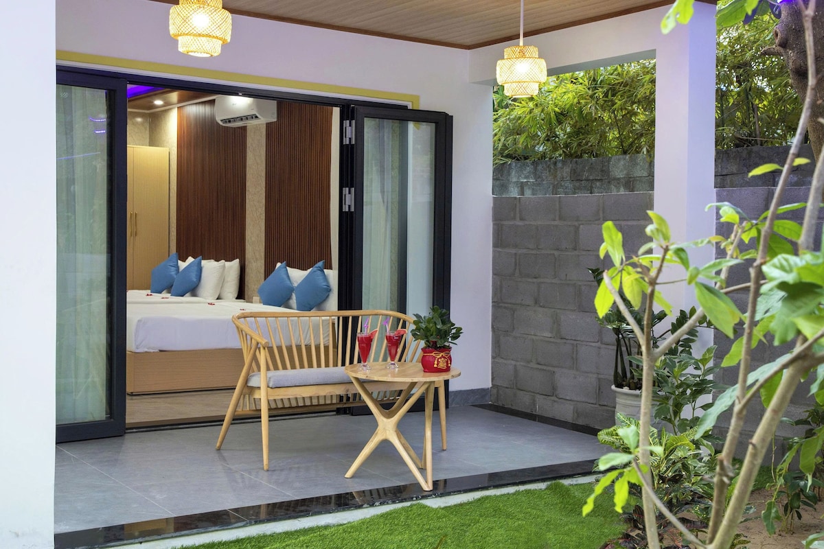 Chambre Quadruple Deluxe, vue jardin | Bureau, Wi-Fi gratuit