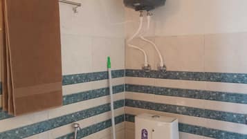 Habitación Deluxe | Baño | Regadera y jabón
