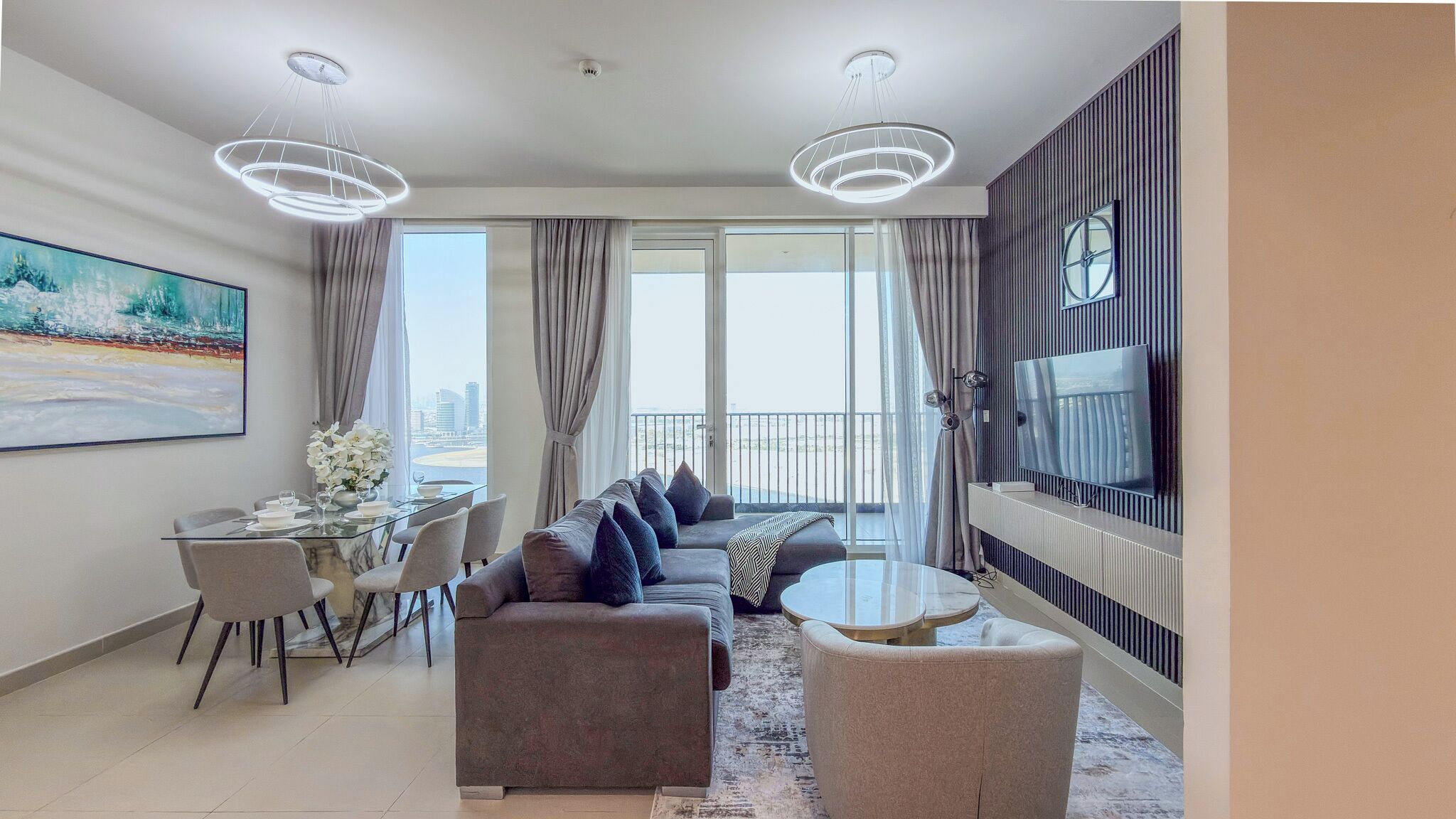 Deluxe Apartment, Balcony, Harbor View | Living area | 55-inch Smart TV with digital channels