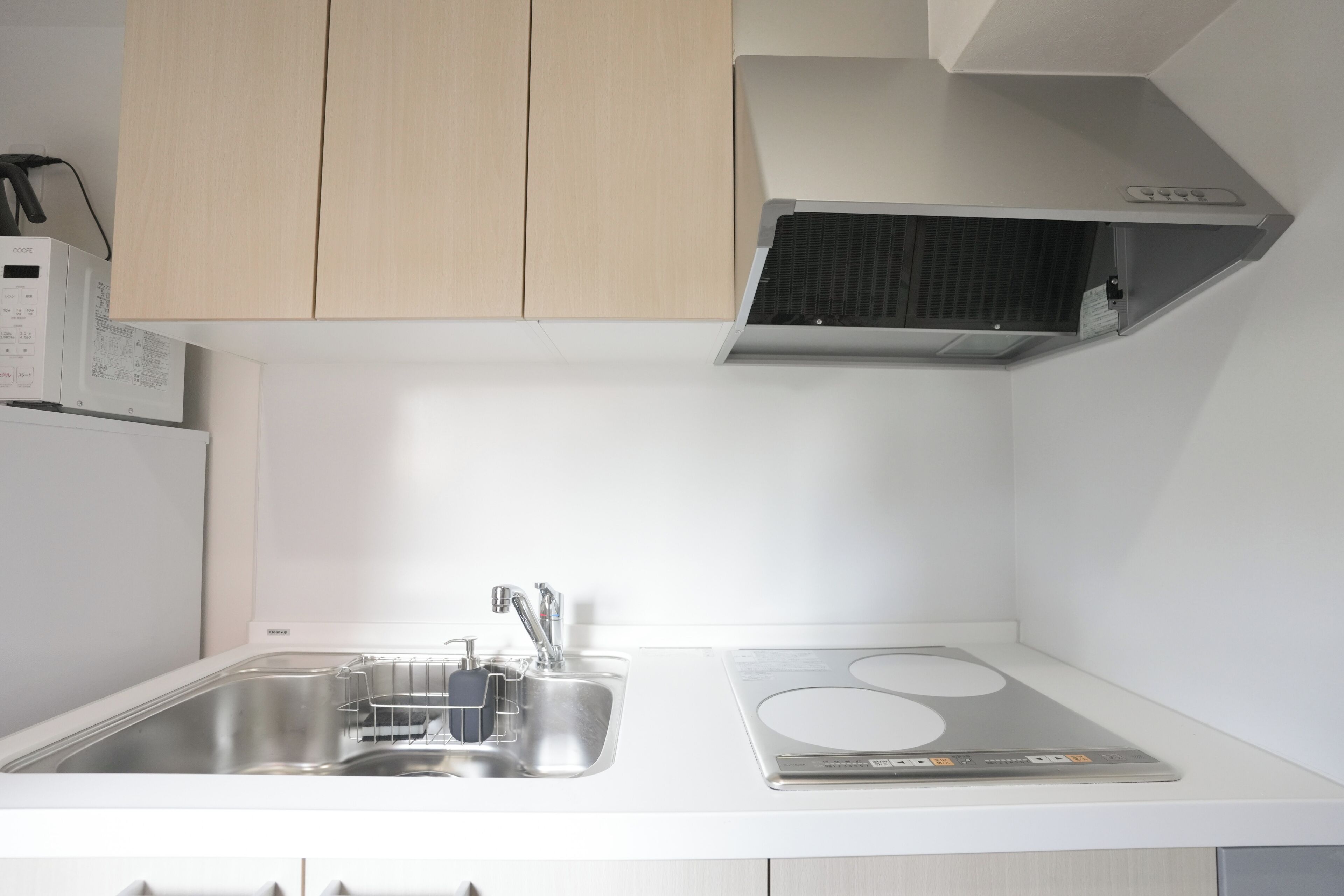 Comfort Quadruple Room (201) | Private kitchen | Fridge, microwave, stovetop, cookware/dishes/utensils