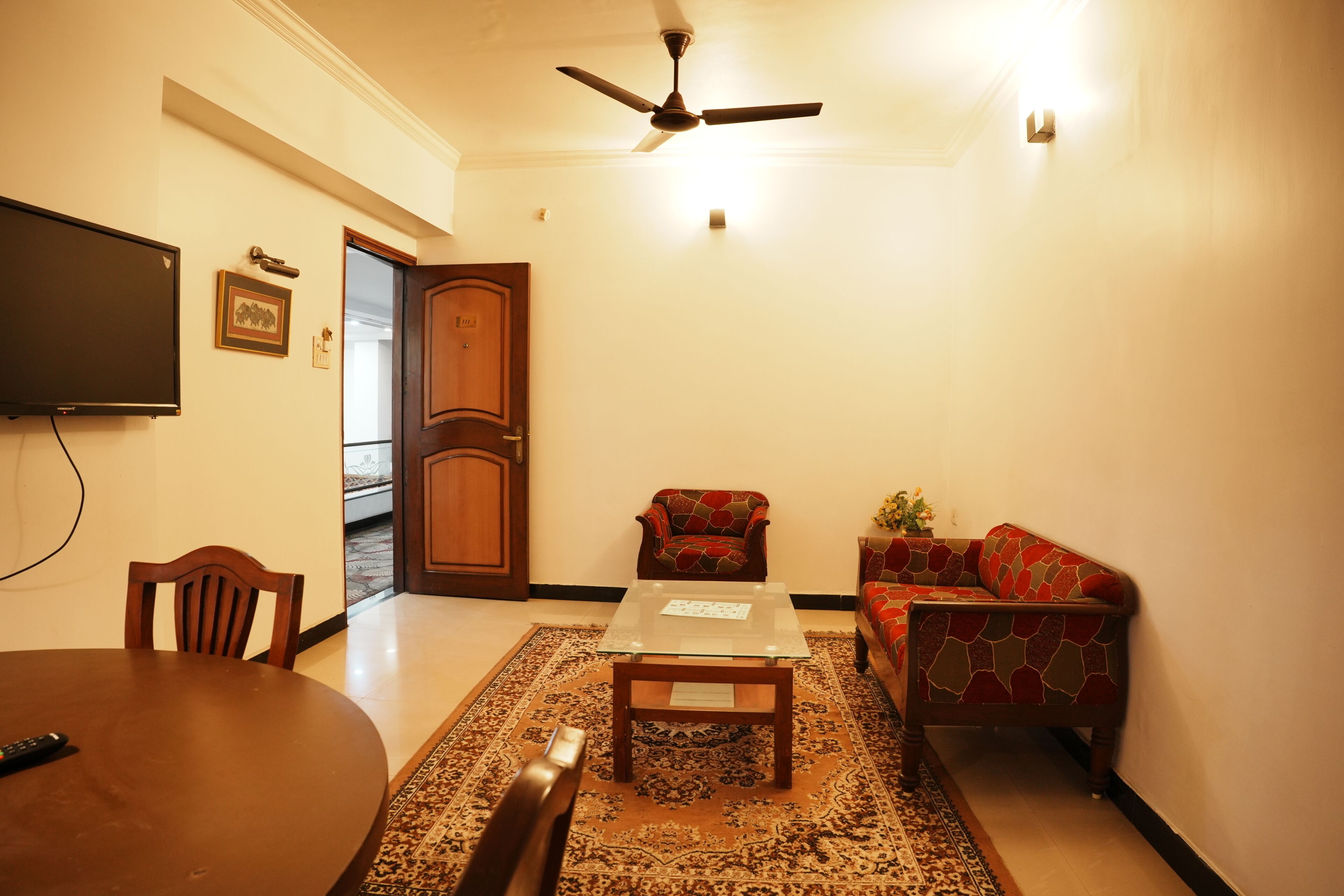 Luxury Room | Living room | 32-inch flat-screen TV with cable channels