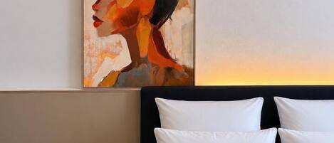 Ropa de cama hipoalergénica y minibar con artículos gratuitos