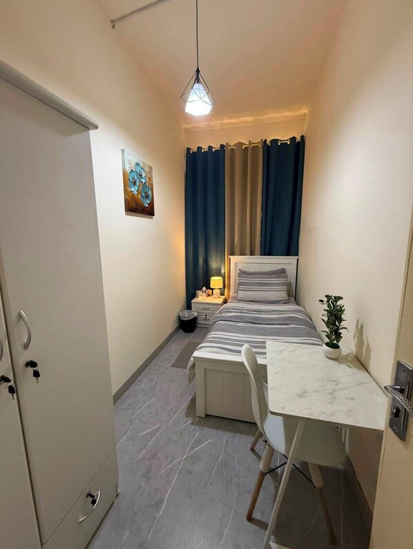 Comfort Single Room, Non Smoking, Shared Bathroom | Down duvets, blackout curtains, iron/ironing board (on request)