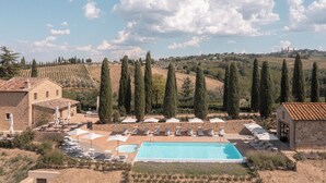 Seasonal outdoor pool, open 9:00 AM to 7:30 PM, pool umbrellas
