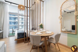 Classic Apartment, Balcony, Canal View | Dining - Dec Tower 1 (Dubai)