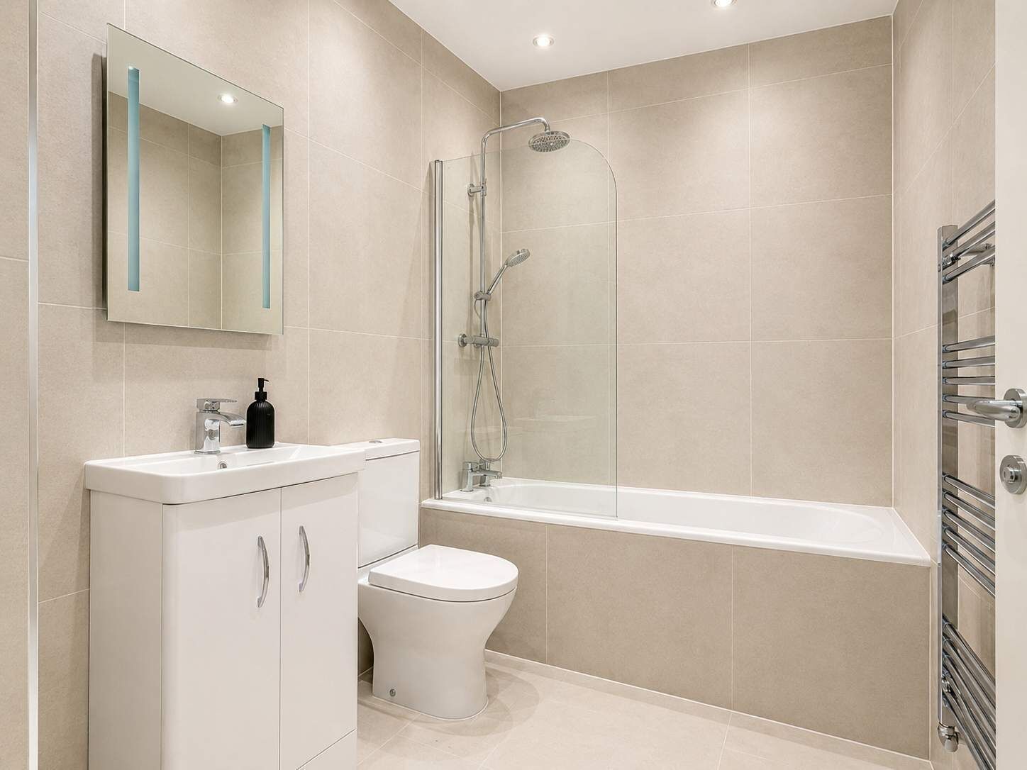 Shower, hair dryer, towels, shampoo