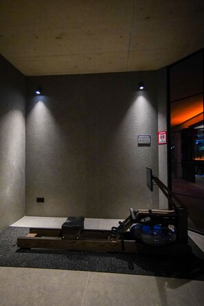 A gym with exercise equipment, a notice sign, and a no children sign. - Luxury Countryside Retreat with Pool, Spa & Gym (Zebbug)