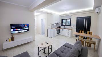 Doppia familiare, balcone, vista montagna | Area soggiorno