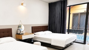 Deluxe Double Room, Patio, Pool View | Laptop workspace