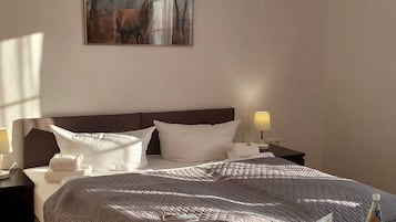 Desk, travel crib, WiFi (free), bed sheets