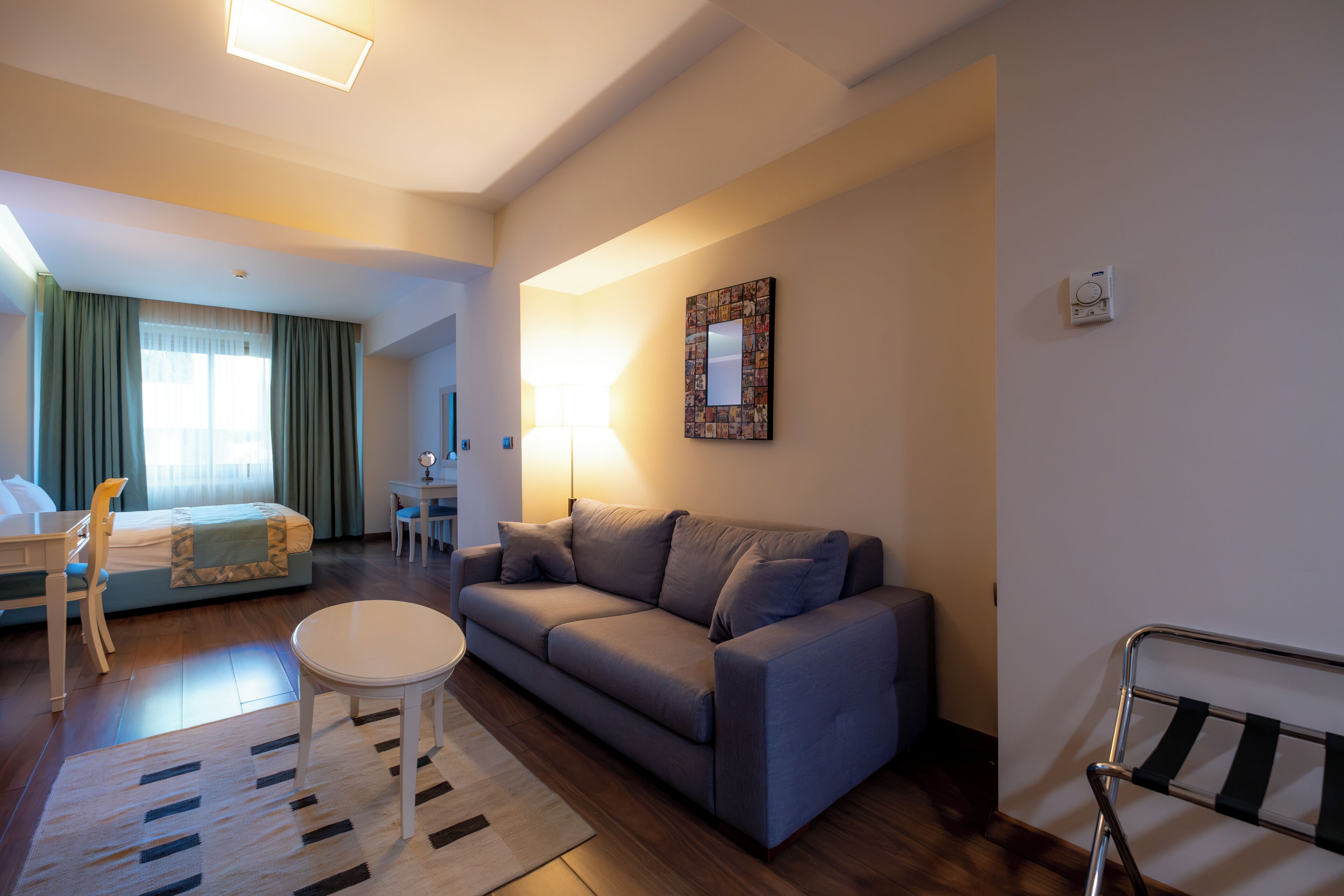 Deluxe Studio, City View | Living area | 51-inch LCD TV with satellite channels
