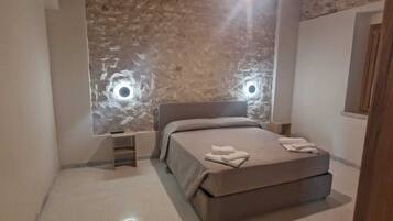 Deluxe Apartment, Patio, Garden View | Iron/ironing board (on request)