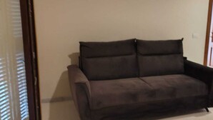Deluxe-Apartment, Terrasse, Gartenblick | Wohnbereich