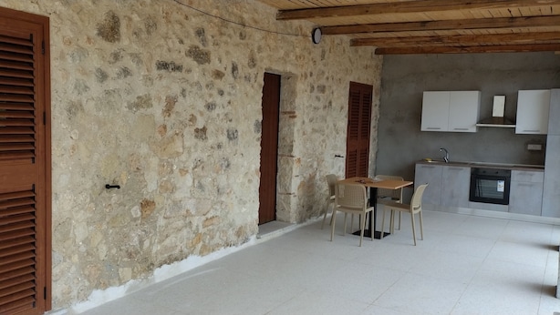 Deluxe-Apartment, Gartenblick | Speisen im Freien
