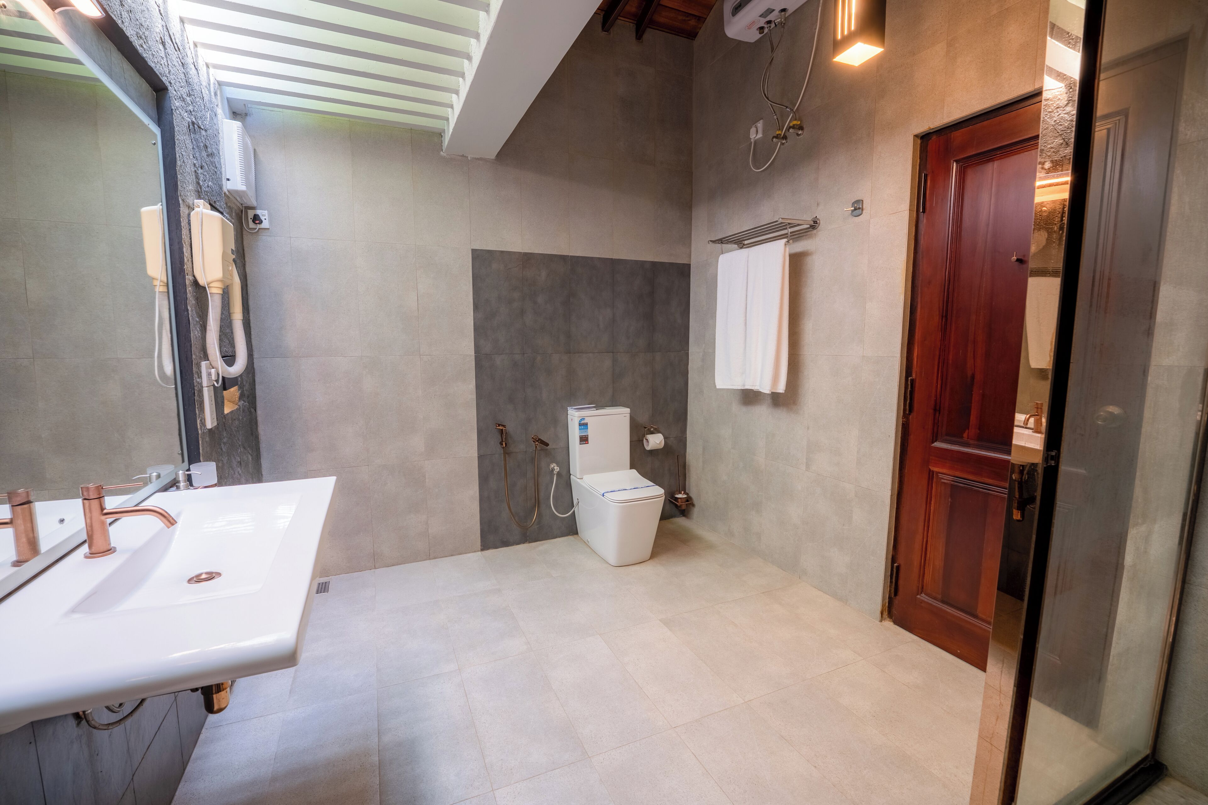 Deluxe Villa, Lagoon View | Bathroom | Shower, rainfall showerhead, hair dryer, bathrobes