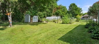 Relax at this pet-friendly Wine Trail retreat featuring a private hot tub, fire pit, spacious deck, and fenced yard. Minutes from wineries, breweries, waterfalls, scenic hikes, and Watkins Glen.