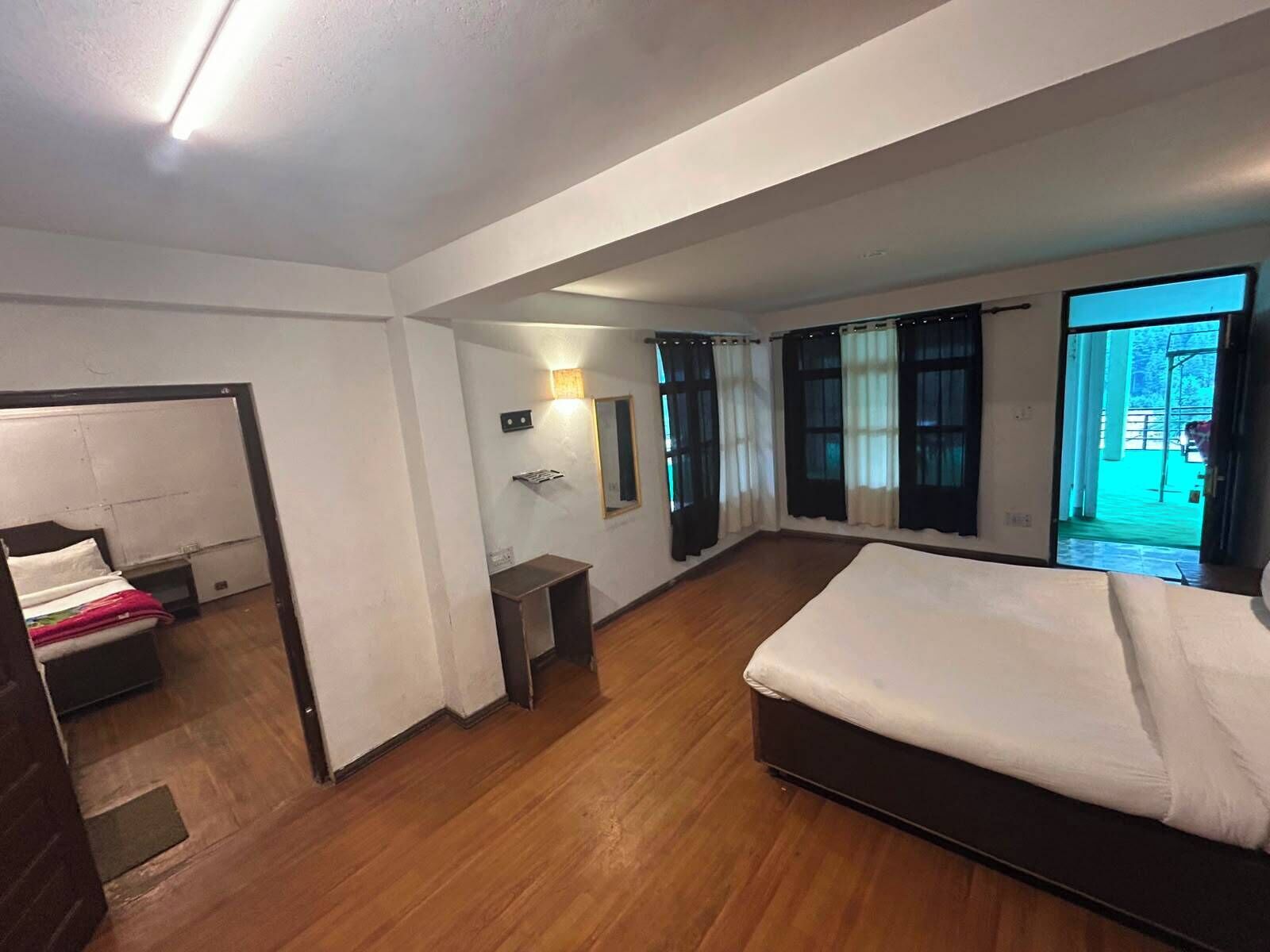 Familiekamer, balkon, uitzicht op rivier | Gratis wifi