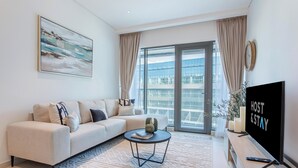 Deluxe-Apartment, 1 Schlafzimmer, Balkon | Wohnbereich
