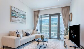 Deluxe-Apartment, 1 Schlafzimmer, Balkon | Wohnbereich