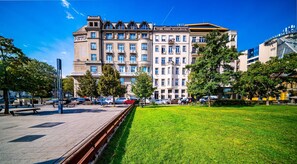 A multi-story building with a flat roof and a balcony on the second floor. - Between the River & Pedestrian Zone: Exclusive Central Nook – 311 (Budapest)