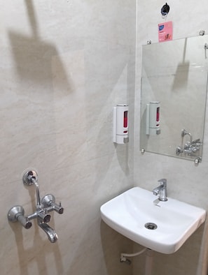 Economy Triple Room | Bathroom | Shower, free toiletries, towels, soap