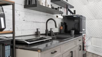 Coffee/tea maker, fridge, microwave, cookware/dishes/utensils