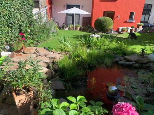 Apartment „Individuelle Terrassenwohnung“ mit gemeinsamer Terrasse und WLAN