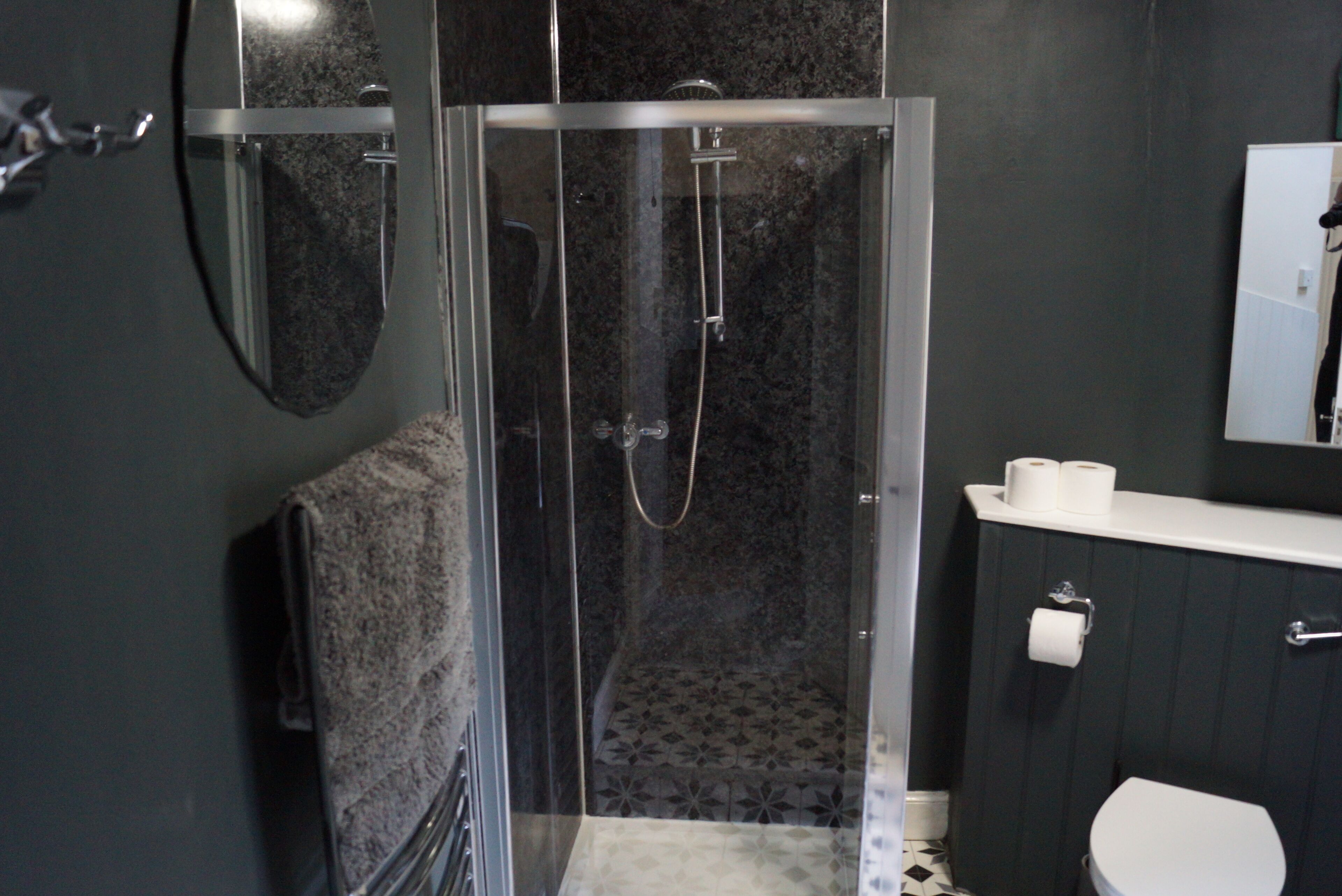Shower, hair dryer, towels, soap