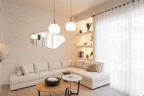 Apartamento Deluxe | Zona de estar