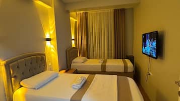 Standard Quadruple Room | WiFi (free), bed sheets