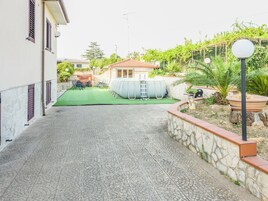 Apartment, Patio, Pool View | Property grounds