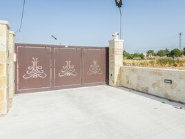 Apartment, Patio, Pool View | Property grounds