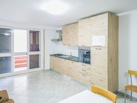 Apartment, Patio, Pool View | Private kitchen