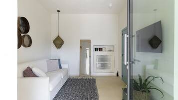 Deluxe Suite, Sea View (Spa) | Living area
