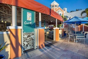 Outdoor dining - 1BR Hot Tub Getaway + Pool Views (Orlando)