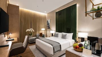 Deluxe Double or Twin Room, City View | In-room safe, desk, laptop workspace, blackout drapes