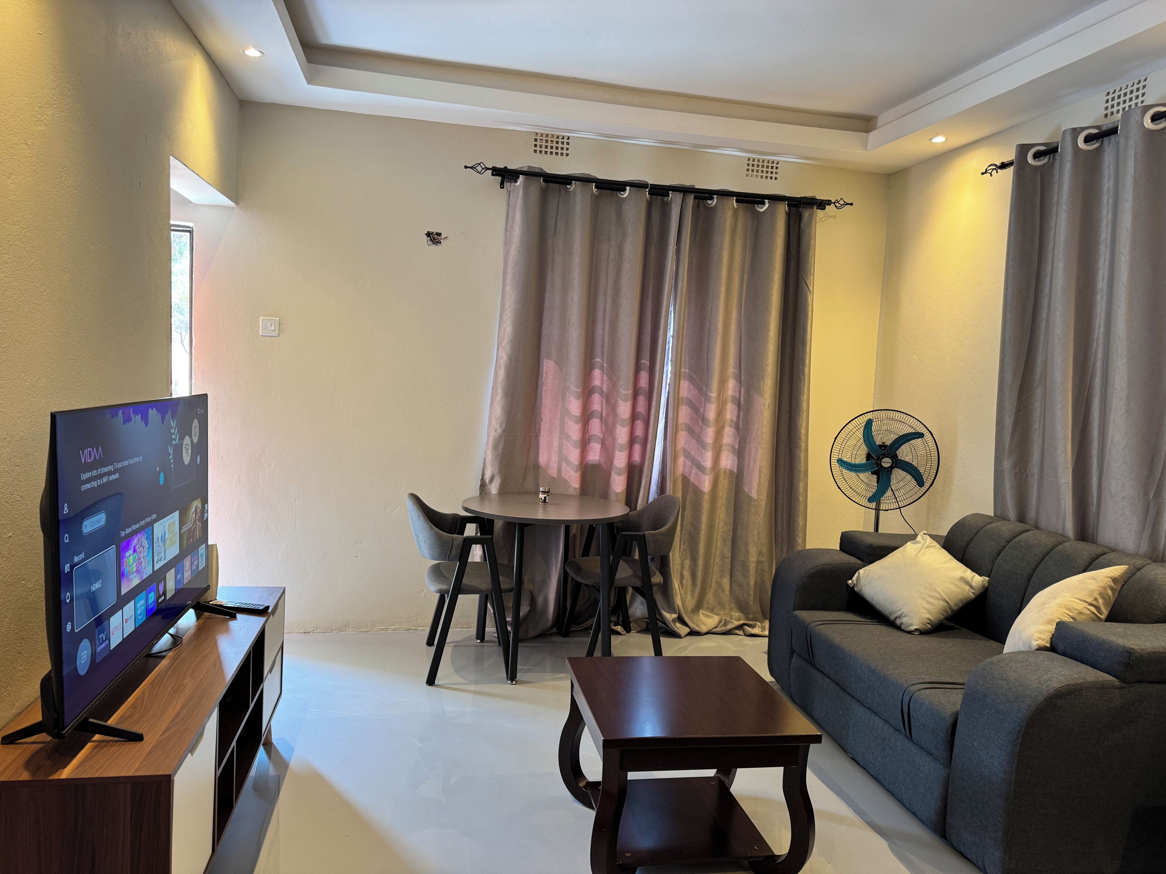 Appartamento Deluxe, 1 letto matrimoniale, vista giardino | Area soggiorno