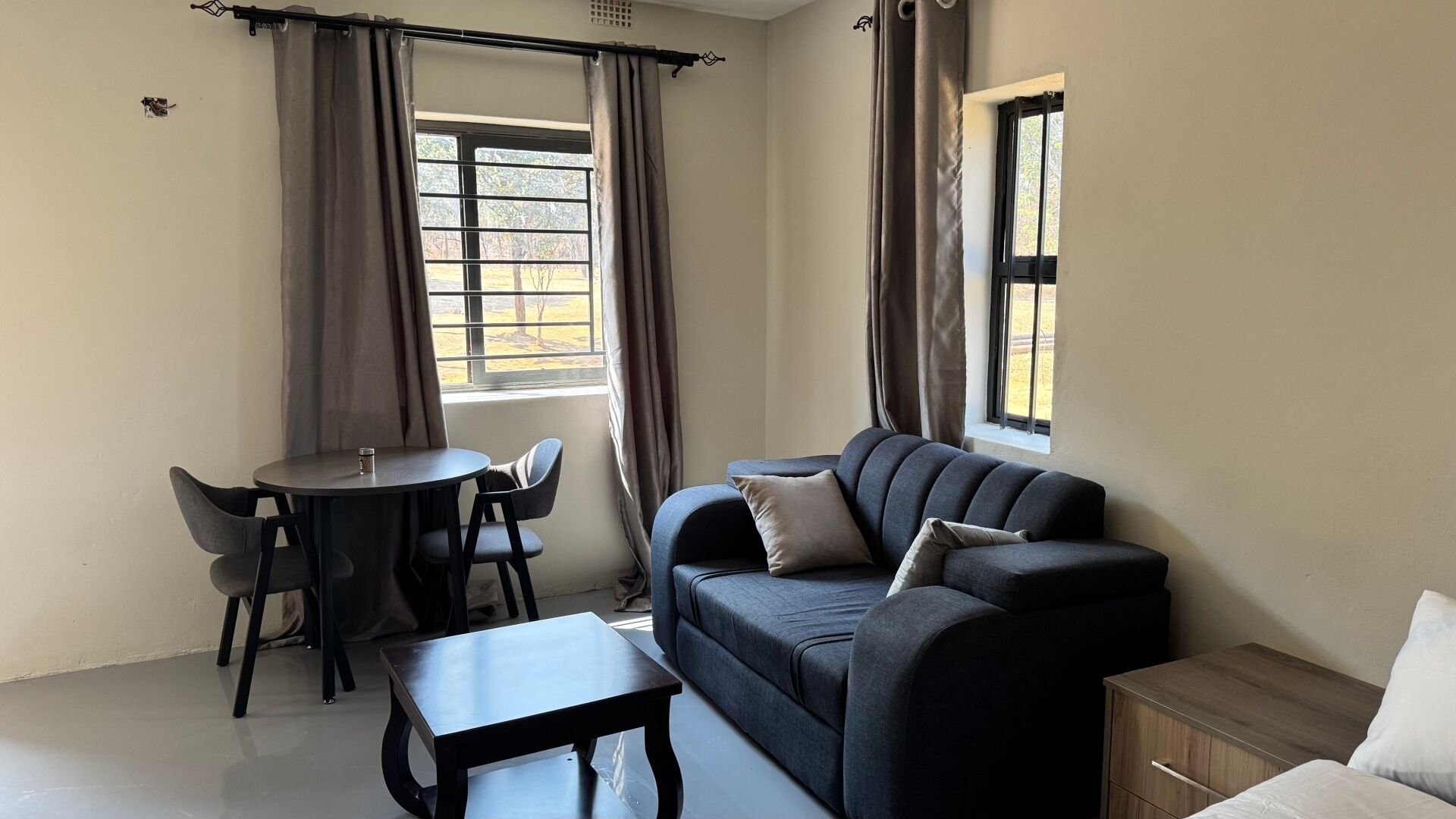 Deluxe appartement, 1 tweepersoonsbed, uitzicht op tuin | Woonruimte