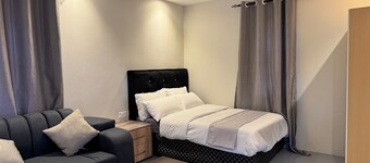 Menzi Apartments
