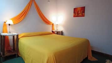 Comfort Room, Patio, Garden View | In-room safe, laptop workspace, blackout drapes, WiFi (free)