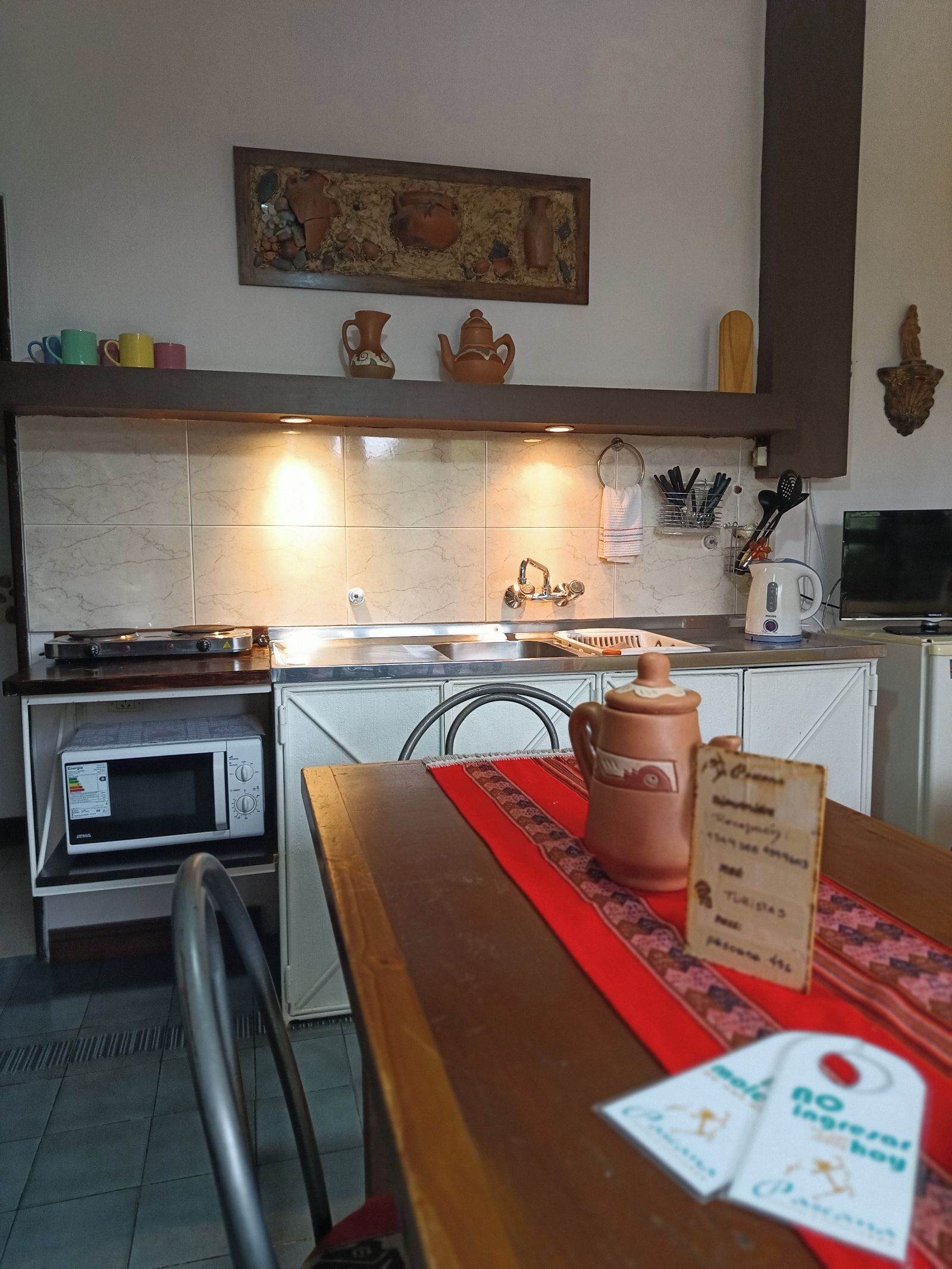 Cabaña Confort, patio, vista al jardín | Cocina privada | Frigobar y microondas 