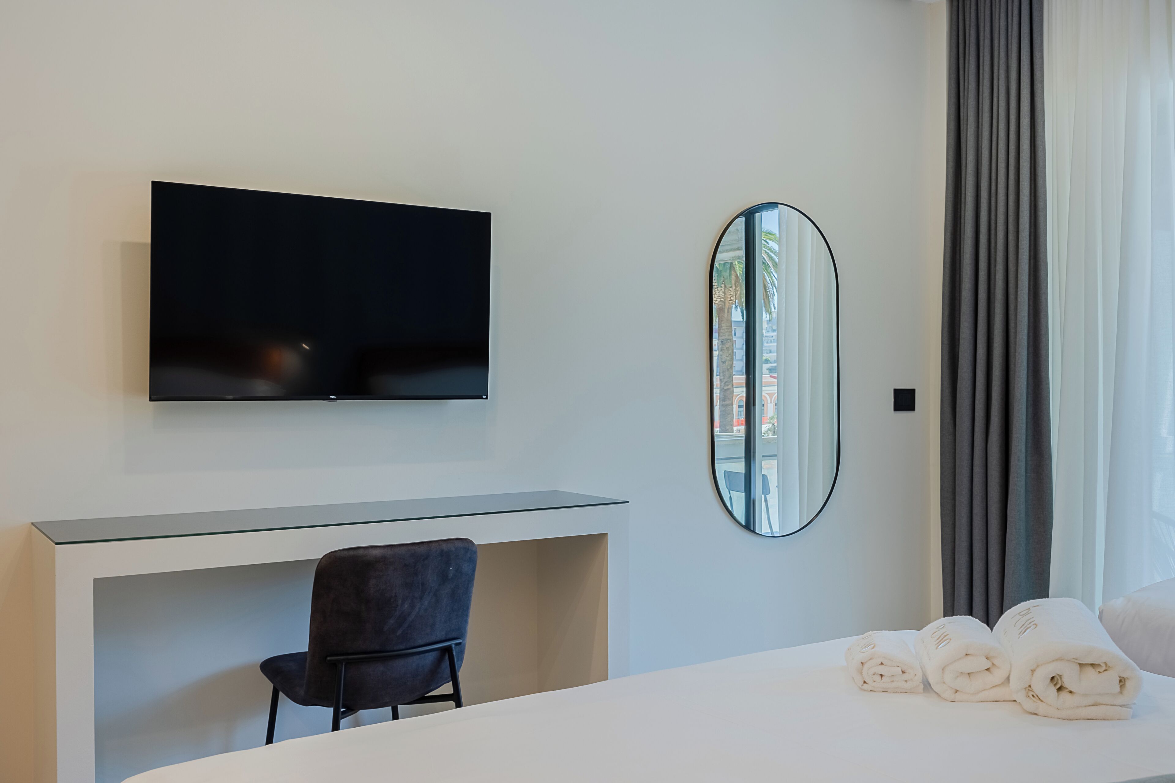 Luxury Triple Room, Balcony, Garden View | In-room safe, desk, laptop workspace, blackout drapes