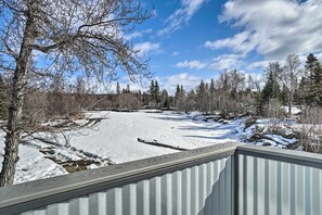 A snow-covered landscape with a metal railing in the foreground. - Northern Lights View! 2-unit 'fitz Creek Retreat' (Homer)